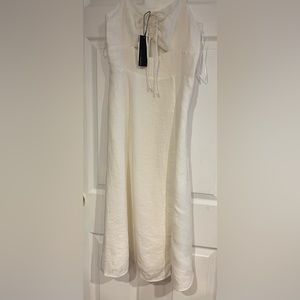 NWT Lucy Paris dress XS, white with a peephole in the front, excellent condition